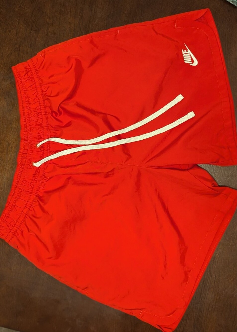 Nike Red Shorts with White Drawstring and Swoosh